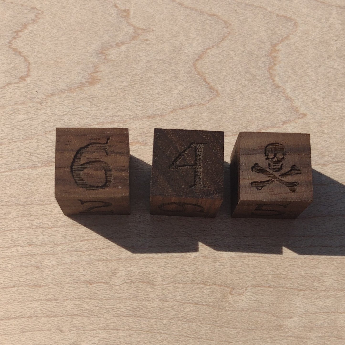 Walnut Skull & Crossbones Die
